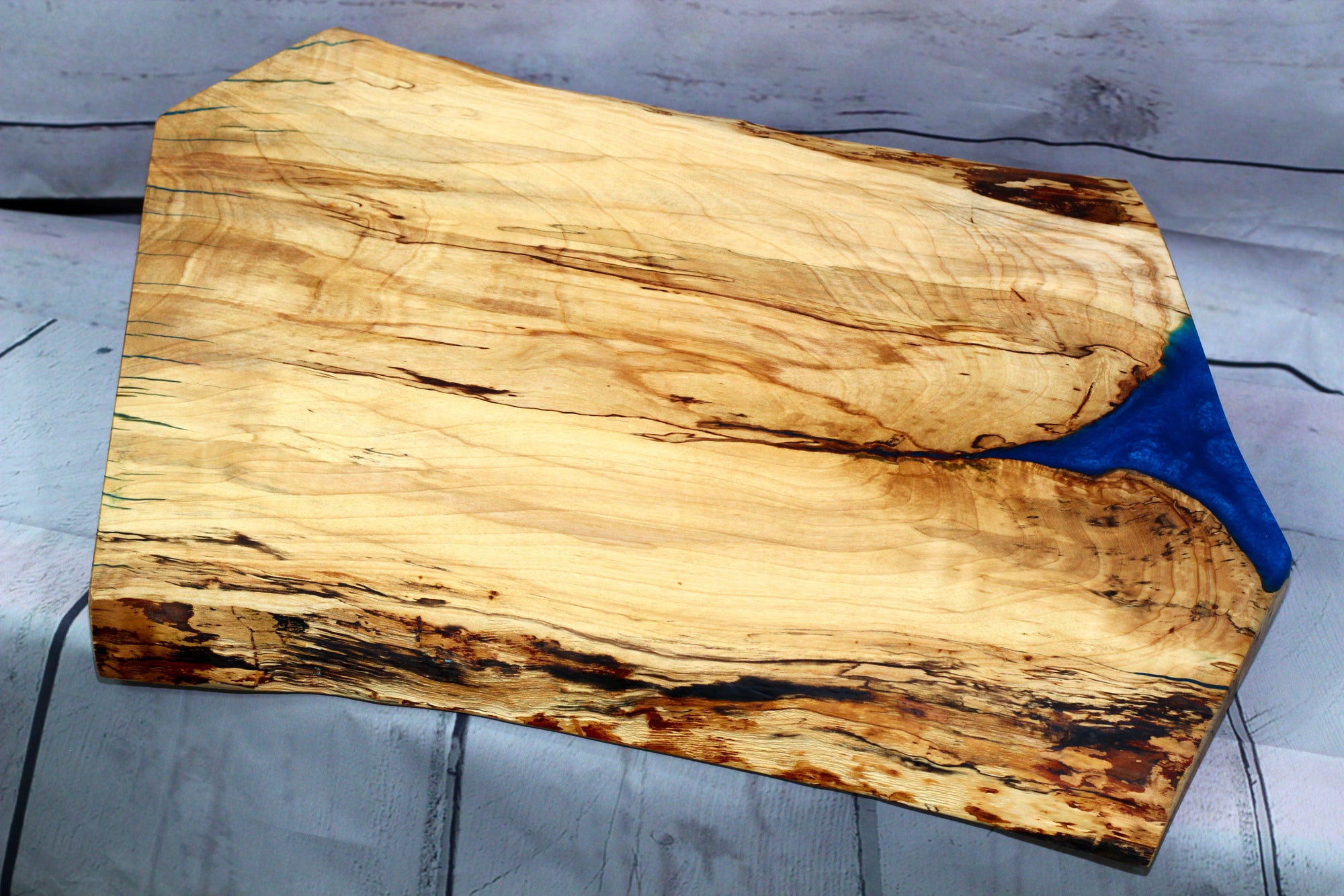 Charcuterie board (live edge birch with blue epoxy sold)