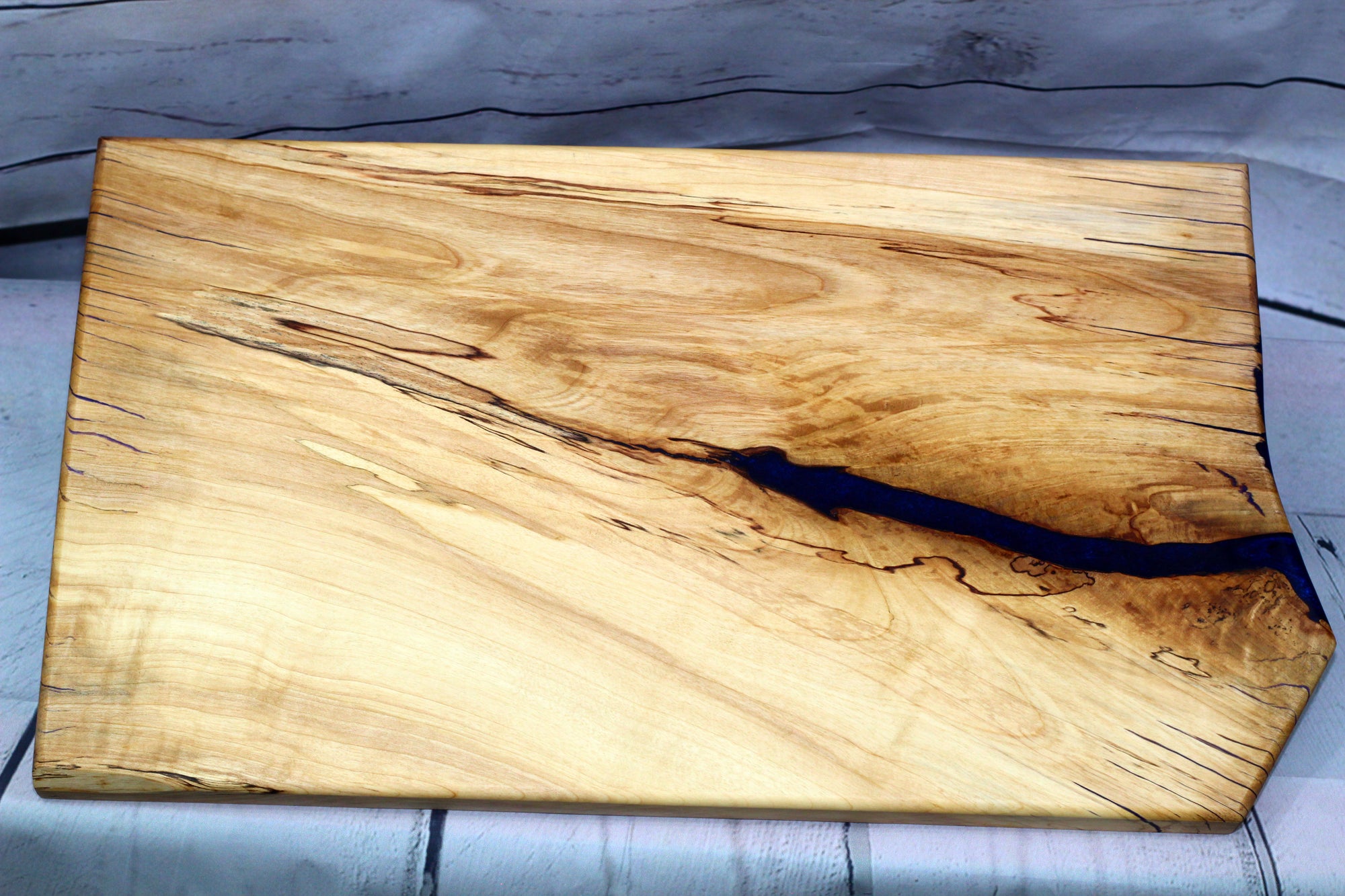Charcuterie board (live edge birch with purple epoxy)